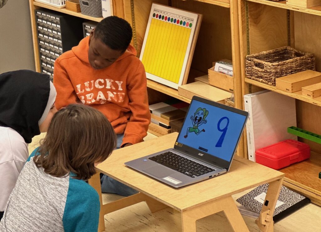 Student learn a song with 100 digits of pi at Chesapeake Montessori School in Virginia.