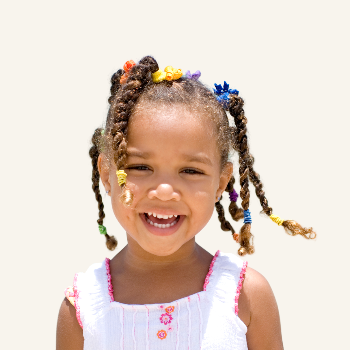 A elementary student smiling.