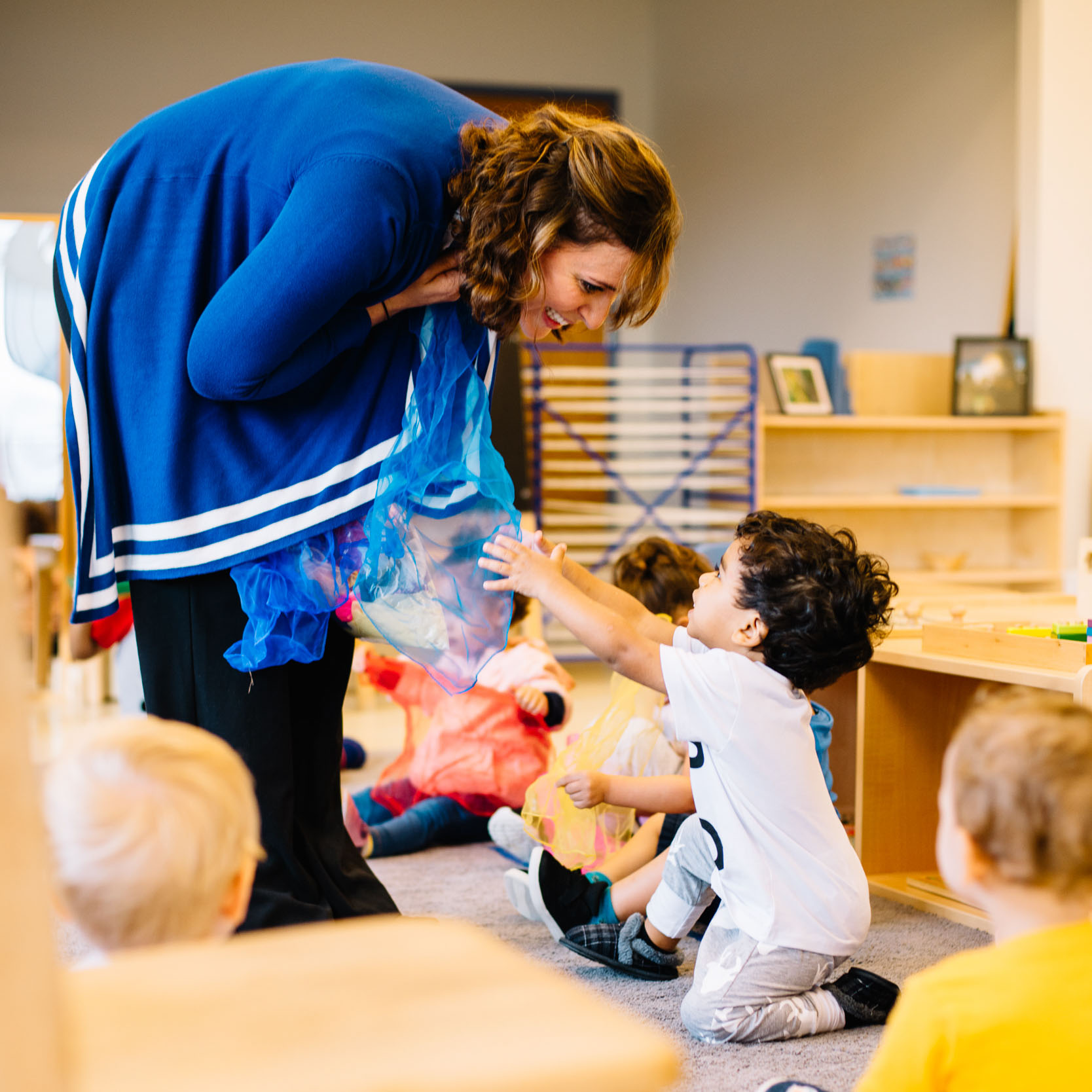 A teacher and a toddler.